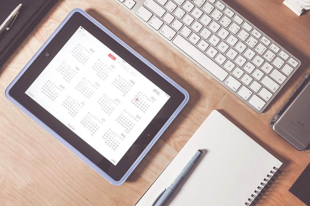 James Chen reading in his organized home office